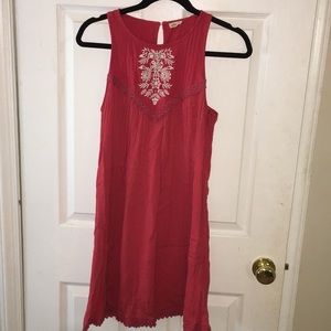 Red/burnt orange colored high neck dress